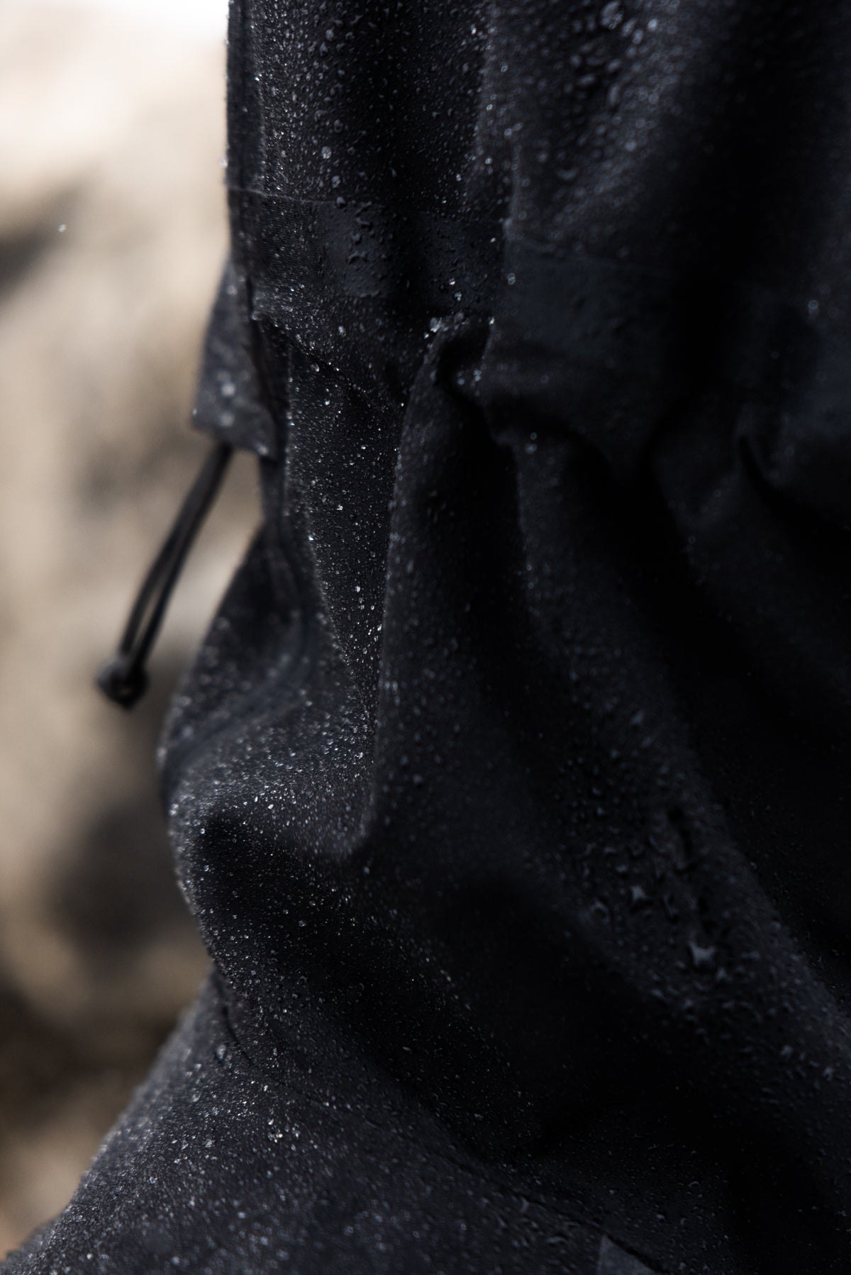 TECHNICAL RAIN JACKET